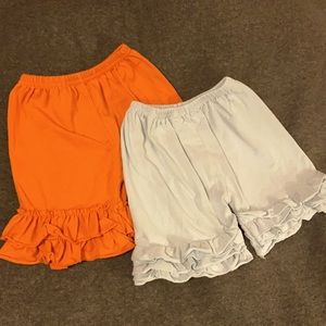 Two pair Size 4 ruffle leg shorts.